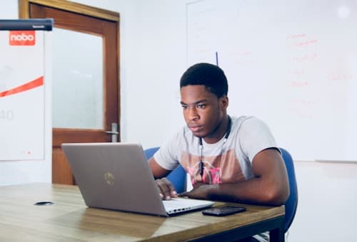 A learner working in a digital hub