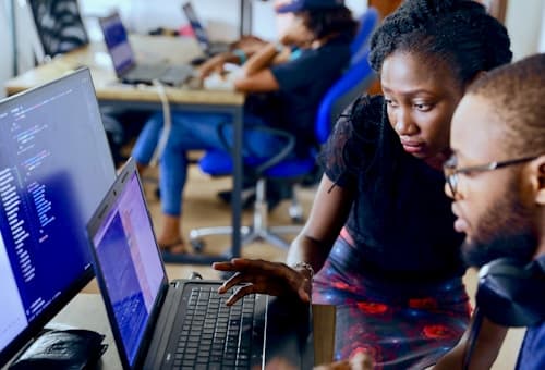 Students learning digital skills at school